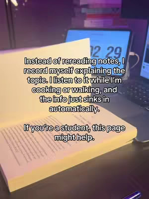 The cover image shows an open book on a desk, with a laptop and other items in the background. Text overlay is visible. The lighting seems to be from a lamp at the side.