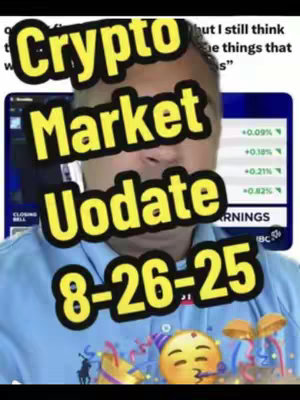 A man is centered in the frame, with text overlays on the image. Bold yellow text reads 'Crypto Market Update 8-26-25'. The man is wearing a blue polo shirt. Behind him, a screen displays financial data, adding context about cryptocurrency. A party hat emoji and other decorative elements are present, suggesting a celebratory tone.
