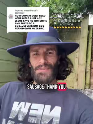 A man in a blue hat and a dark blue t-shirt, centered in the frame. The background is slightly blurred, with green foliage and wooden fencing visible. A speech bubble with text and two comments is near his left shoulder. At the bottom, a red rectangle reads 'SAUSAGE THANK YOU'.