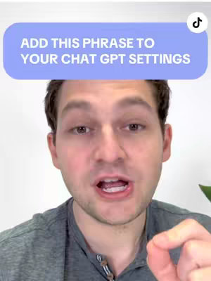 A medium shot shows a man in a gray shirt, gazing intently at the camera. Above him is a light blue rectangle containing white text. The background is a plain white wall.