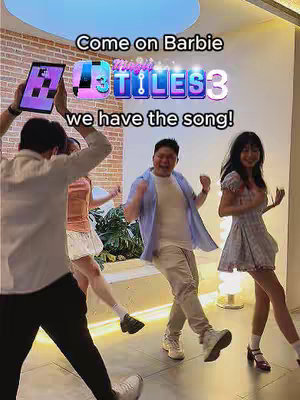 The cover image displays a group of four people dancing in an indoor setting with bright lighting. The background is a neutral-toned wall with textures, and a brick wall on the left. The text 'Come on Barbie, Magic Tiles 3 we have the song!' is overlaid.