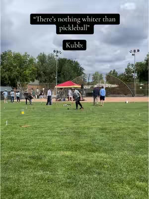 The cover image shows a grassy field with several people playing a game. Above the field, two text boxes display the phrases "There's nothing whiter than pickleball" and "Kubb:" against a cloudy background.