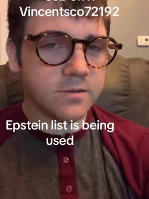 A selfie-style video cover image featuring a man wearing glasses. He's in a close-up shot from the chest up, against a blurred background. The man is looking slightly towards the camera. Text overlays above the man's head and along the bottom of the image.
