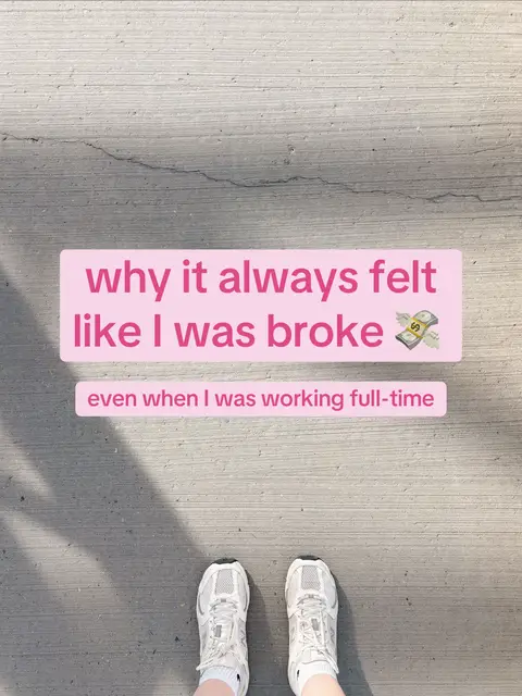 The image shows a top-down view of a person's feet in white sneakers, standing on a gray concrete surface. Overlayed on top of the feet is a pink rectangle that contains text: 'why it always felt like I was broke' and 'even when I was working full-time'. The background is a plain concrete surface with some cracks.