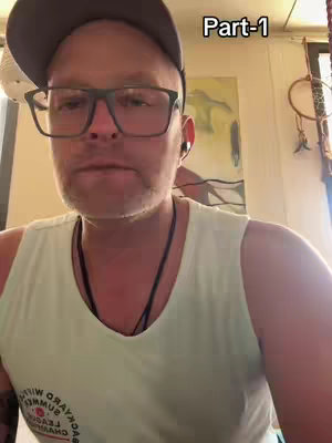 A man wearing a baseball cap, glasses, and a tank top is centered in the frame. The text "Part-1" is visible in the upper right corner.