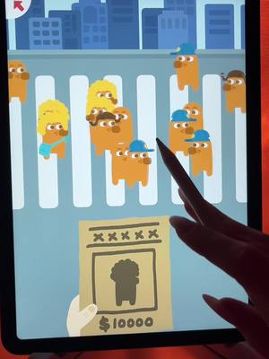 The cover image displays a mobile game interface on a tablet. Several cartoon characters are shown on a cityscape background. The foreground shows a hand holding a drawing on the tablet screen.