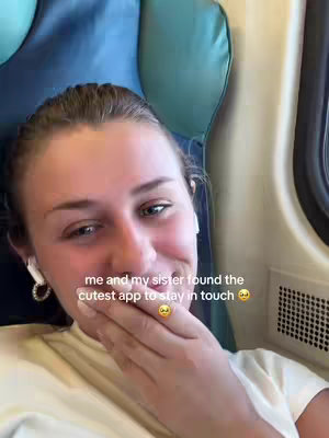 A selfie-style shot with a woman covering her mouth with her hand. Text overlaid says, "me and my sister found the cutest app to stay in touch" along with an emoji.