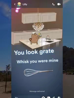 The image shows a cartoon bear character holding an object in front of a kitchen setting composed of white cabinetry, a kitchen island with a sink, and a chandelier. Text overlays feature romantic puns.