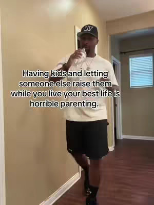 A man in a white t-shirt, black shorts, and a baseball cap is standing in what appears to be a hallway. The cover is framed from the waist up and shows a man holding a white bottle, presumably a water bottle. The background consists of beige walls and a doorway. Text is overlaid on the image.