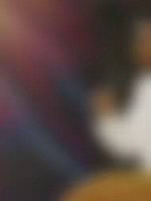 The cover image is a blurry, abstract composition with dominant colors of deep red, dark blue, and a hint of yellow. The image appears to be a close-up or a part of a larger scene that is heavily out of focus, creating a soft, impressionistic effect. The layout is asymmetrical, with the colored areas blending into each other.