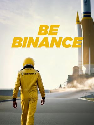 The image features a person in a yellow flight suit walking away from the camera. The person is wearing a yellow helmet with the "Binance" logo. The background includes a racetrack, a rocket, and a bright, cloudy sky. Large yellow text, "BE BINANCE," overlays the scene. The overall composition suggests a theme of adventure and high aspirations.