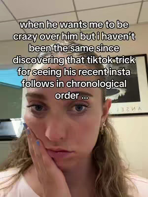 The cover image shows a close-up of a young woman's face, looking down and to the side with a pensive expression. Her hand is raised, with her fingers touching her cheek. The background is a blurred room interior with white walls, a picture frame and a window. Text overlayed reads: 'when he wants me to be crazy over him but i haven't been the same since discovering that tiktok trick for seeing his recent insta follows in chronological order ...'. The color palette is muted, with the focus on the woman's face and her emotional state.