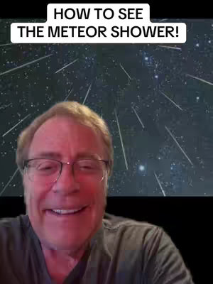 The cover features a man with glasses smiling at the camera. Behind him is a simulated night sky with streaks representing shooting stars, and a text overlay that reads, 'HOW TO SEE THE METEOR SHOWER!'.