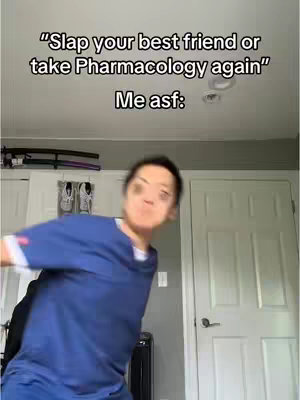 A person in a blue shirt is captured mid-action, with a blurred background suggesting movement. Text overlays on the top reading "Slap your best friend or take Pharmacology again" and "Me asf:"