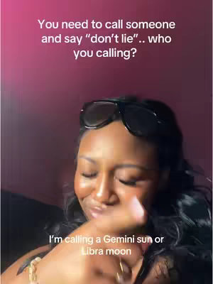 A selfie-style image with a medium shot of a Black woman. She has long, dark curly hair and is wearing sunglasses on her head. She looks down and to the side, smiling slightly. Text overlays are positioned at the top and bottom, against a vibrant purple background.