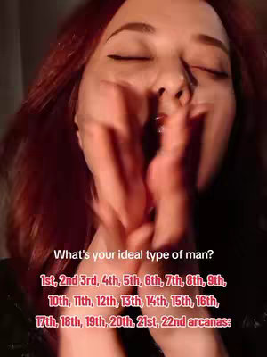 A woman with long red hair is shown with her eyes closed and hands up to her face with the fingertips touching. The background is indistinct. At the bottom is text in white and then red font.