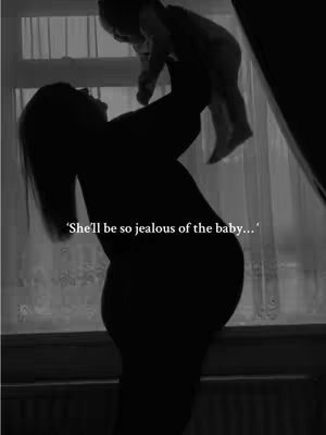 A black and white silhouette of a pregnant woman holding a baby up in the air. The scene takes place in front of a window curtain, with the woman's body and the baby rendered in strong shadows to accent the light shining in through the window.