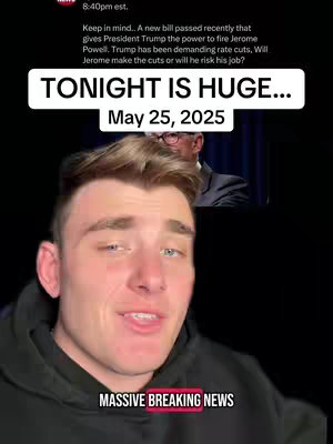 A young man with short blonde hair is centered in a vertical shot. He's wearing a black hoodie with a microphone in front of his face. The background is a black background.