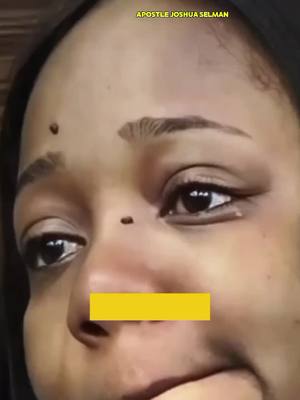 A close-up shot of a woman's face, primarily focusing on her eyes and nose. The woman has light brown skin. Her eyes have dark eyeliner and her eyebrows are well-defined. There are small moles on various parts of her face. A rectangular yellow box is covering her mouth and the lower part of her nose. The background is a blurred depiction of the surroundings. The top-left corner includes yellow text in a sans-serif font.