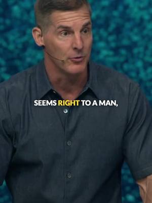 A man in a dark blue shirt is speaking into a microphone against a blurred teal background. Text overlay in white font reads: 'SEEMS RIGHT TO A MAN,'