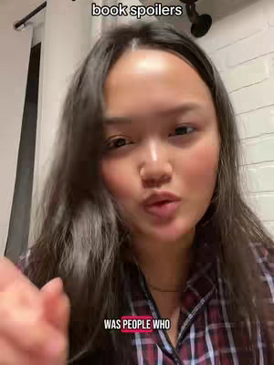A woman with long dark hair looks directly at the viewer, her mouth slightly open as if speaking. Above her head, text reads 'book spoilers'. Below her, in a pink rectangular box, are the words 'WAS PEOPLE WHO'. She wears a plaid shirt.