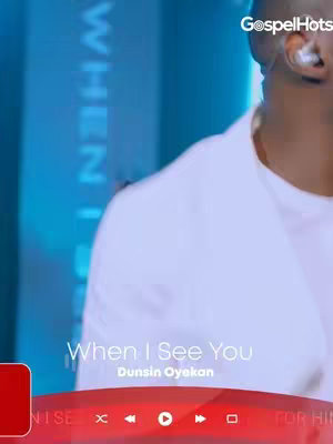 The cover image features a man from the chest up, slightly turned to the side. He is wearing a white shirt and has an earpiece in. Text near the bottom of the frame reads "When I See You Dunsin Oyekan". The background appears to be a blurry blue.
