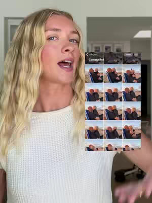 A woman with blonde hair is in front of a camera and shows a phone screen with multiple photos on it. The background is a house.