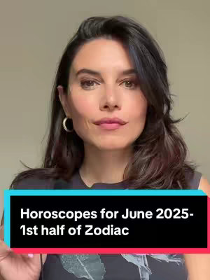A woman with long dark hair and fair skin looks directly at the camera. She's wearing a black top and silver hoop earrings. Below her, a black bar displays text. The background is a soft beige color.