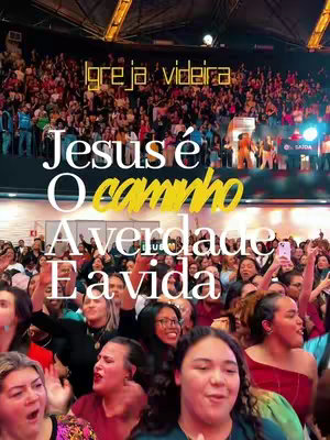 A picture taken in a church, with a lot of people, mostly women, with their arms raised and holding cellphones. Text overlays are spread on the image. The tone is happy and positive.