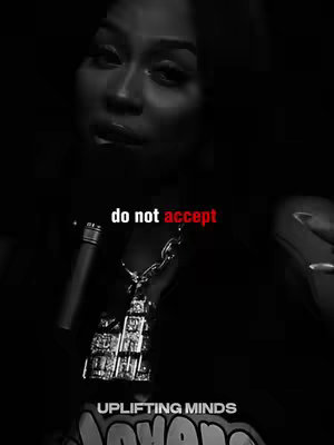 A black and white image featuring a woman with dark hair and wearing a necklace, with the phrase "do not accept" in white letters with the word "accept" colored in red.