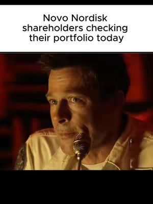 The cover image features a close-up shot of a man speaking into a microphone. Text is overlaid at the top, and the background is dimly lit.