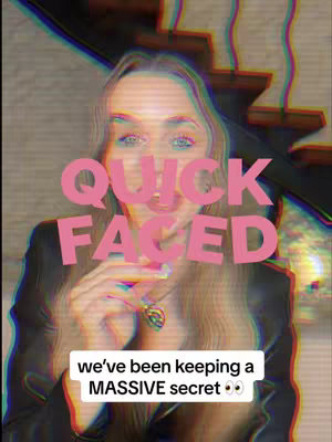 A selfie-style video cover, showcasing a woman's face with a pink overlay of text. The background is blurred, featuring partial stairs. The woman has blonde hair and is wearing a black jacket. A smaller text overlay is at the bottom.