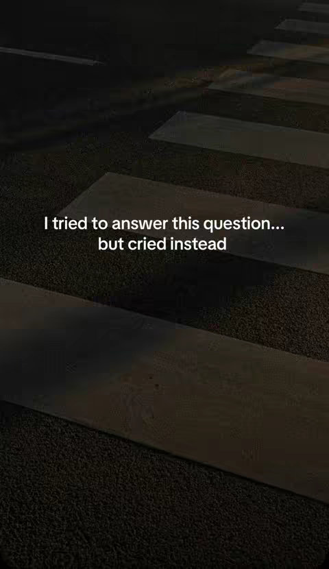 A dark image with a textured floor and diagonal gray lines that form a crosswalk pattern. The text overlay is in white, and reads, "I tried to answer this question... but cried instead."