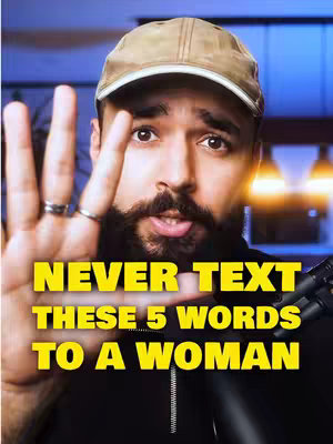 A man with a trimmed beard, wearing a beige cap, looks at the camera with a slightly raised eyebrow and open mouth. He has his left hand up in a stop gesture, palm forward. The background is softly lit with blue and orange hues. Across the foreground, yellow text overlays that reads "NEVER TEXT THESE 5 WORDS  TO A WOMAN".