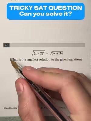 The cover image shows a close-up of a sheet of paper with a math problem and a hand holding a pen over it. The top of the paper has some text overlayed on it.