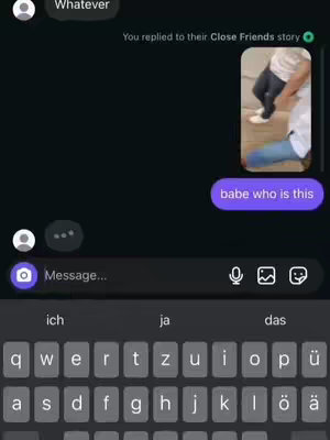 A screenshot of a phone's messaging app, displaying a conversation.  The background is a dark purple. A message bubble containing the phrase 'babe who is this' is displayed.  A preview picture is in the top right shows a photo of people walking down the street.