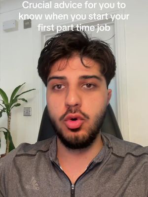 A young man with dark hair and a beard is in the foreground, speaking directly to the camera. Above him is text in white font, giving advice about starting a part-time job. In the background, a green plant is visible, alongside a plain wall. The frame is lit, creating a well-lit and clear shot.