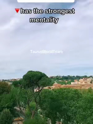 The cover image shows a view from above, likely from a high vantage point. In the background, there's a light clouded sky. Below the sky, there are green trees and some buildings, suggesting an urban or suburban setting with a natural backdrop. It looks like a pretty view from a high place.