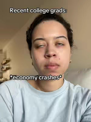 A close-up shot of a woman with short, dark hair and neutral skin tone. Her eyes are half-closed and slightly unfocused, with a subtle expression. Above her head, white text overlays the image. Below the woman, more text, also in white, overlays the image.