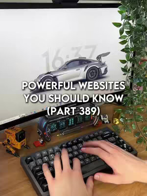 The cover image shows a desk setup with a computer monitor displaying a racing car graphic. Below the monitor, a keyboard is in focus showing hands typing. Various desk accessories are scattered around. Text overlays at the top explains the videos subject.