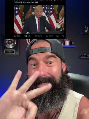 A man with a beard and a black cap is holding up three fingers. Behind him is a screenshot of Donald Trump speaking, with flags in the background and text from a social media post. The man appears to be on camera.