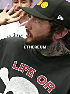 The cover image features a man in a black t-shirt and a black cap smiling and looking to the side. Overlaid in the image is the word "ETHEREUM", and a tattoo is visible on his neck underneath. The shirt shows the word "LIFE OR", a skeleton image, and the color of the text is red.
