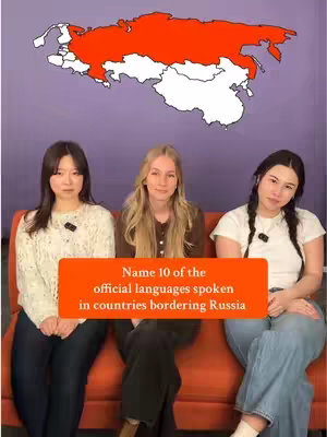 Three women seated on an orange sofa with a purple background. Above them is a map of Eurasia, with Russia highlighted in red and neighboring countries in white. An orange rectangle overlays the women, displaying the text 'Name 10 of the official languages spoken in countries bordering Russia'.