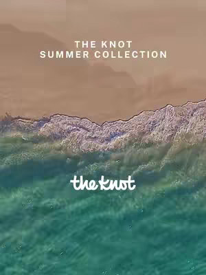 An aerial view of a beach. The top part of the image shows a light brown sand. The lower part shows the green ocean with the white waves, and the text overlayed is in white.