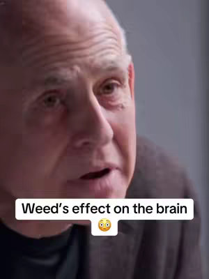 The cover image shows a headshot of an older man speaking, set against a blurred background. A white rectangular overlay at the bottom displays text.