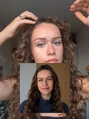 The cover image features a woman partially framed by her arms and curly hair. In the center of the image, a smaller photo shows a different image of the woman. The image uses a warm color palette and good lighting.
