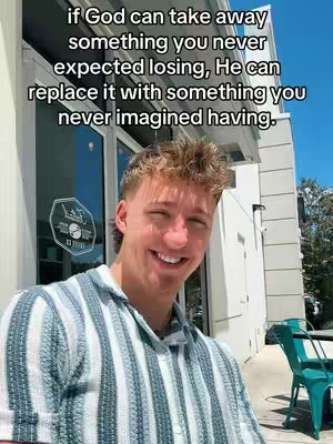 A young man with light hair and a striped shirt smiles broadly in front of a building. Text overlays his head, offering inspirational words.