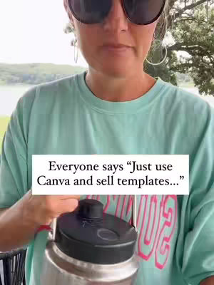 A woman is filmed from the chest up, wearing sunglasses and a teal shirt. Overlayed is a white rectangle of text. The background contains a body of water and trees out of focus.