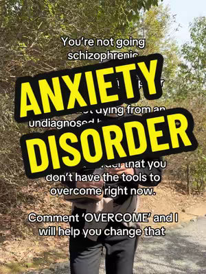 A medium shot of a person in front of a blurry forest background. The person is seen from the chest up, wearing a dark outfit. Overlaid on the image are large, yellow and black text boxes. The topmost text box reads 'ANXIETY', and a second text box below reads 'DISORDER'. The caption invites viewers to comment 'OVERCOME' to receive free training.