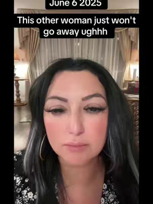 The cover image shows a woman with dark hair and large hoop earrings, framed from the chest up. She's looking slightly down and to her left, with the text overlayed in the upper portion indicating a date and a message. The background is somewhat out of focus, but appears to be a domestic setting with curtains visible.